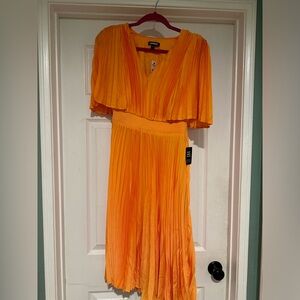 Tangerine pleated dress